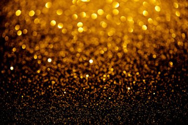 Altın glitter doku, tatil arka plan bulanık