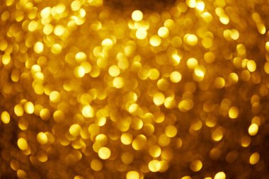 abstract blurred gold glowing background clipart