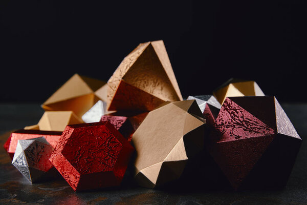 close-up view of beautiful shiny faceted minerals on black background 