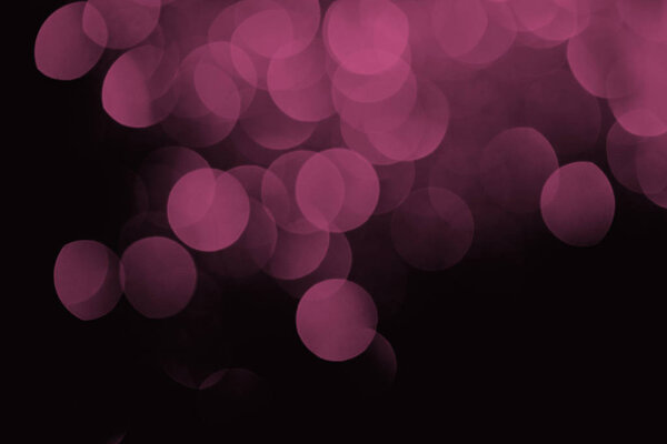 праздничный фиолетовый боке на черном фоне
 