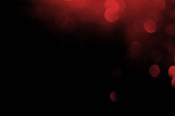 お祝いのための黒の背景に赤のボケ味 — ストック写真