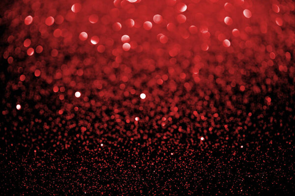 red blurred glitter texture, holiday background