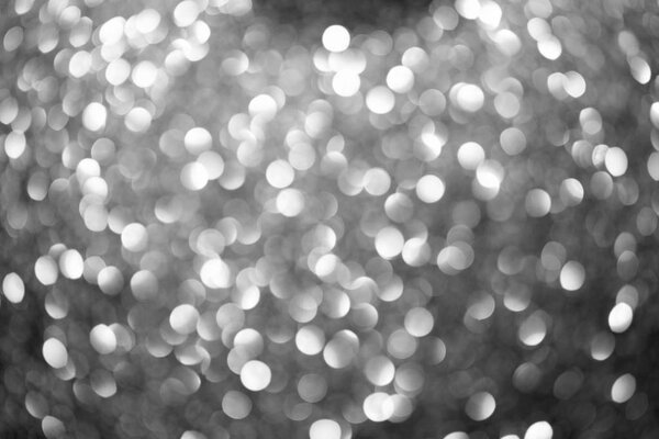 abstract shiny blurred silver glowing background