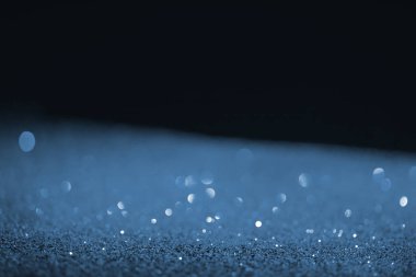 siyah arka plan ile mavi glitter ve bokeh