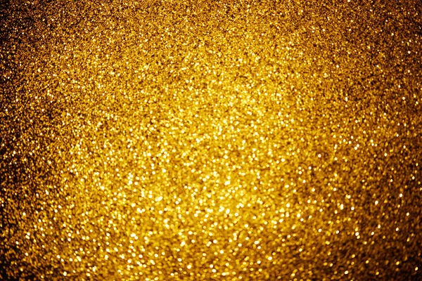 光沢のあるゴールドのキラキラ装飾が施された抽象的な背景 — ストック写真