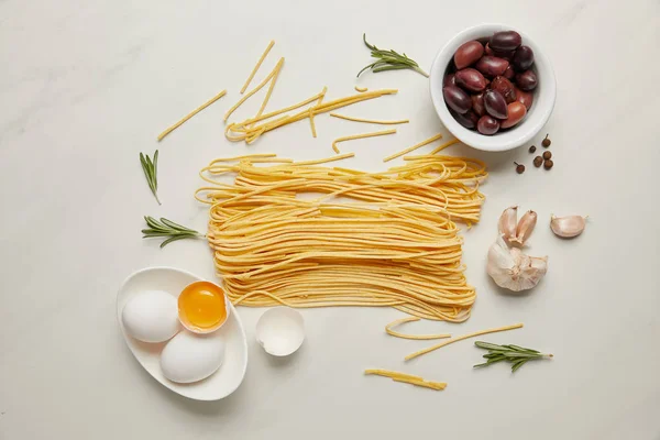 Flat Lat Assorted Italian Pasta Ingredients Arranged White Marble Surface — Stock Photo, Image