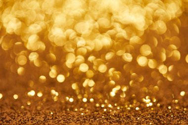 golden bokeh christmas background with glittering sequins
