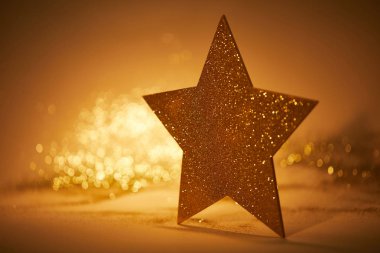 golden sparkling star for christmas decoration clipart
