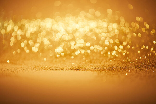 bokeh christmas background with golden glitter