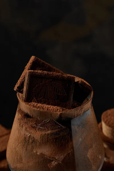 Close View Glass Delicious Chocolate Pieces Cocoa Powder — Stock Photo, Image