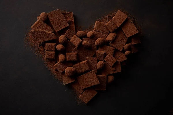 Top View Tasty Chocolate Nuts Cocoa Powder Arranged Shape Heart — Stock Photo, Image