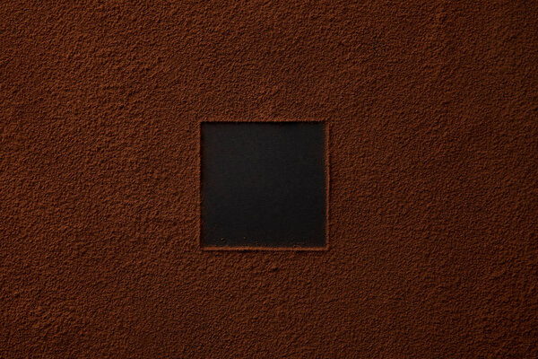 top view of gourmet cocoa powder with square copy space on black background 