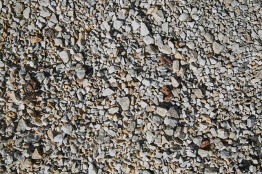top view of textured pebble stones ground clipart