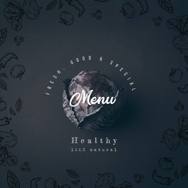 top view of red cabbage on gray table with "healthy menu" lettering