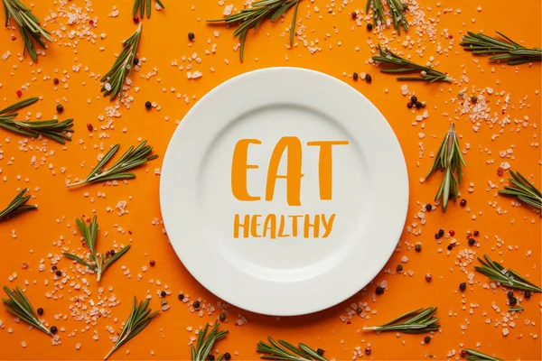 Top View White Plate Eat Healthy Lettering Rosemary Salt Peppercorns — Stock Photo, Image