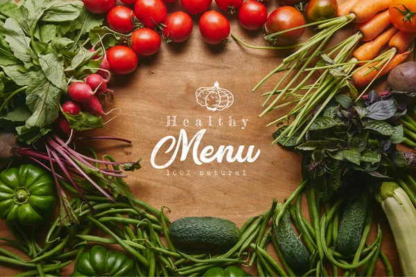 Frame of healthy green and red vegetables on wooden table with "healthy menu" lettering — Stock Image Frame Healthy Green Red Vegetables Wooden Table Healthy Menu Lettering Stock Picture