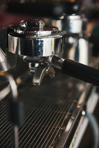 close-up view of professional coffee maker in coffeehouse 