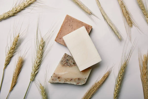 Top View Various Handmade Soap Wheat White Marble Surface — Stock Photo, Image