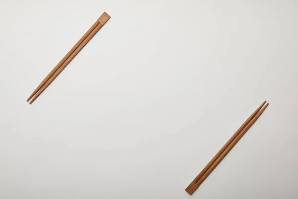 Flat Lay Arranged Chopsticks White Surface Minimalistic Concept — Stock Photo, Image