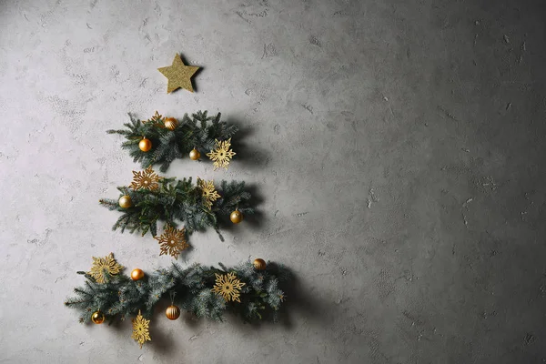 Handmade Christmas tree hanging on grey wall in room — Stock Image Handmade Christmas Tree Hanging Grey Wall Room Stock Picture