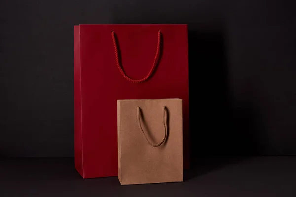 Paper Bags Black Surface Black Friday Concept — Stock Photo, Image