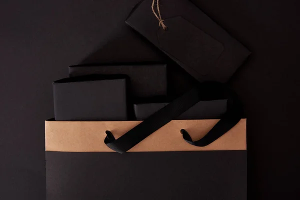 Top View Black Boxes Shopping Bag Black Surface Black Friday — Stock Photo, Image