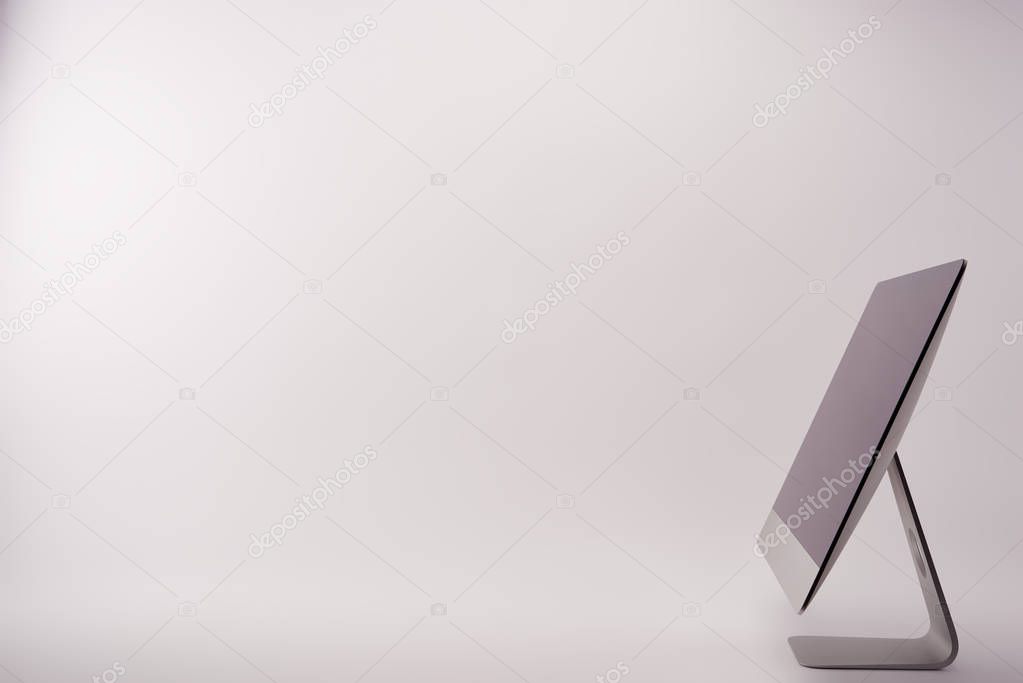 side view of computer with blank screen on white, black friday concept