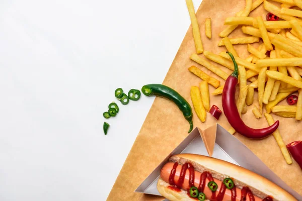 Top View Spicy Hot Dog Fries Parchment Paper Isolated White — Free Stock Photo