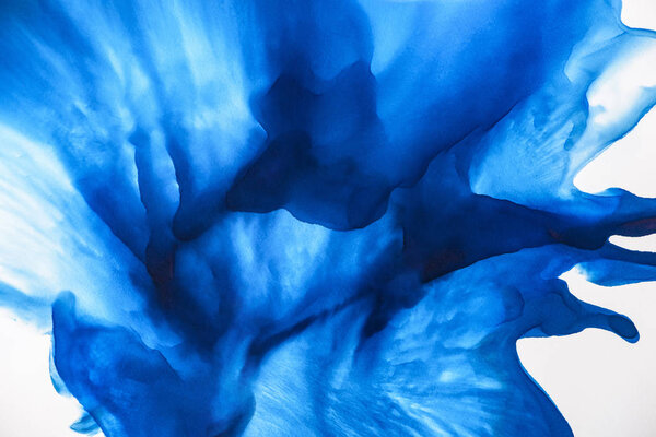 beautiful blue splashes of alcohol ink as abstract background