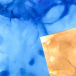 Prachtige blauwe en gele plonsen van alcohol inkten als abstracte achtergrond