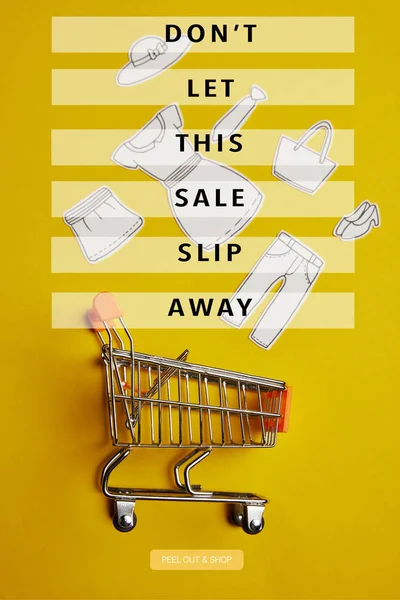 Kağıt kıyafet ile küçük alışveriş arabası sarı zemin üzerinde görünümünü en çok, bu Satış irsaliyesi uzak yazıt izin verme