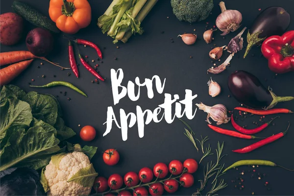 Top view of unprocessed vegetables on gray table with bon appetit lettering — Stock Image Top View Unprocessed Vegetables Gray Table Bon Appetit Lettering Stock Image