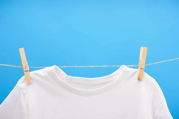 Close View Clean White Shirt Clothespins Hanging Rope Isolated Blue — Stock Photo, Image