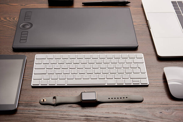 close-up shot of different devices on graphics designer workplace