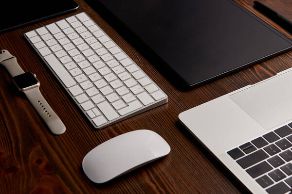 close-up shot of different gadgets on graphics designer workplace