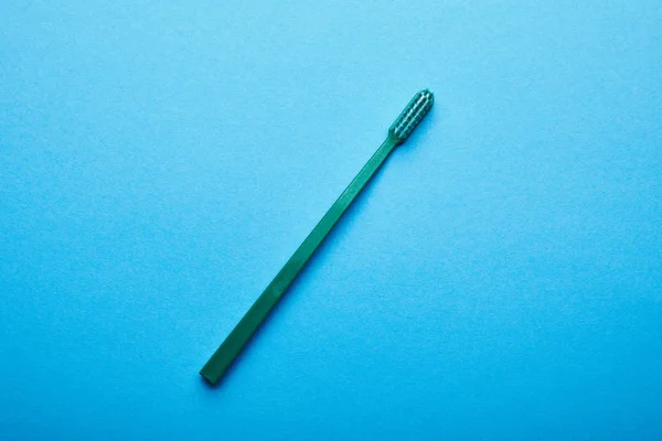 Top View Toothbrush Blue Tabletop — Free Stock Photo