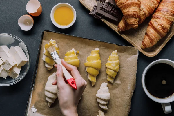 Partial View Woman Brushing Dough Croissants Tray Baking Paper Ingredients — Stock Photo, Image