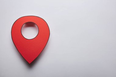 red geolocation icon on grey background clipart
