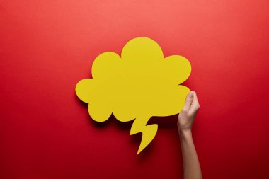 top view of empty yellow thought bubble on red background clipart