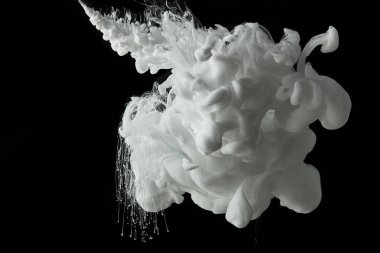 white paint flowing in water on black background clipart
