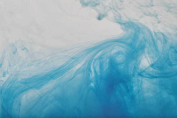 абстрактный фон с голубыми вихрями краски
