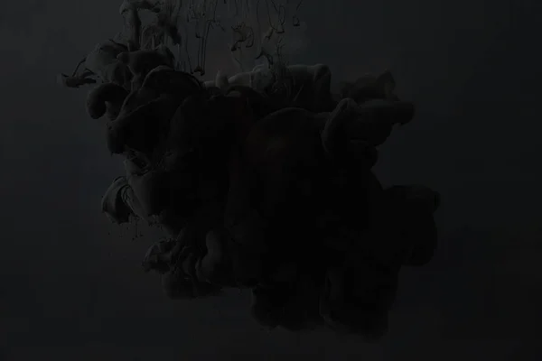 黑色丙烯酸油漆飞溅在黑暗的背景 — 图库照片