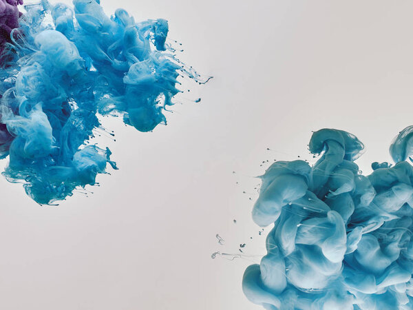 blue splashes of paint on white background
