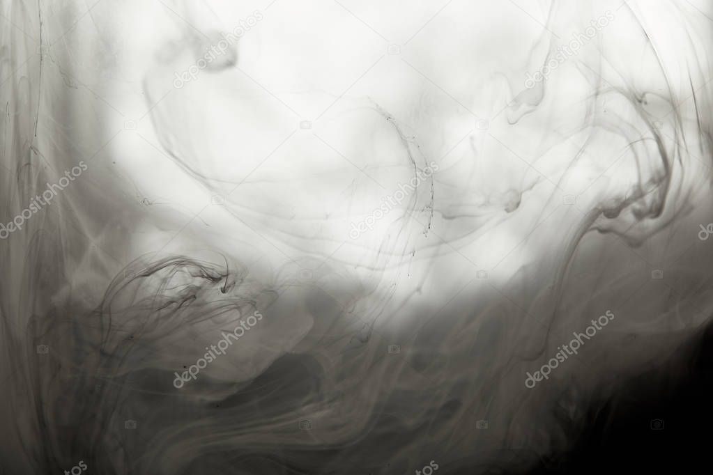 abstract smoky texture with black paint swirls