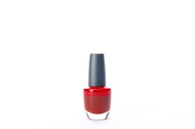 bottle of shiny red nail polish isolated on white clipart