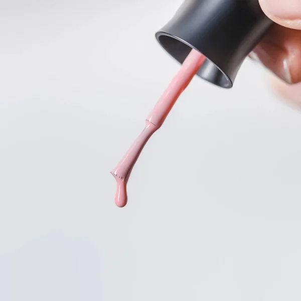 Partial View Woman Holding Brush Pink Dripping Nail Polish Isolated — Stock Photo, Image