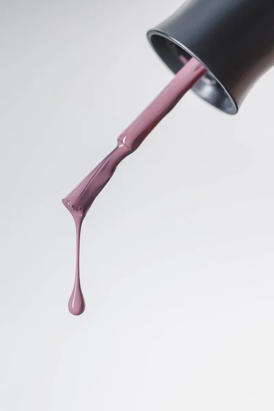 Close View Nail Polish Brush Lilac Drop Isolated Grey — Stock Photo, Image