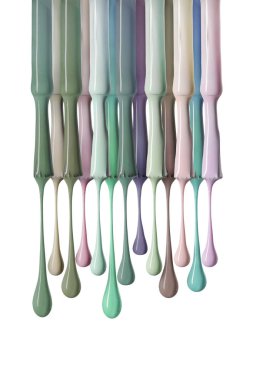 wet brushes with variation of green pastel nail polish isolated on white clipart