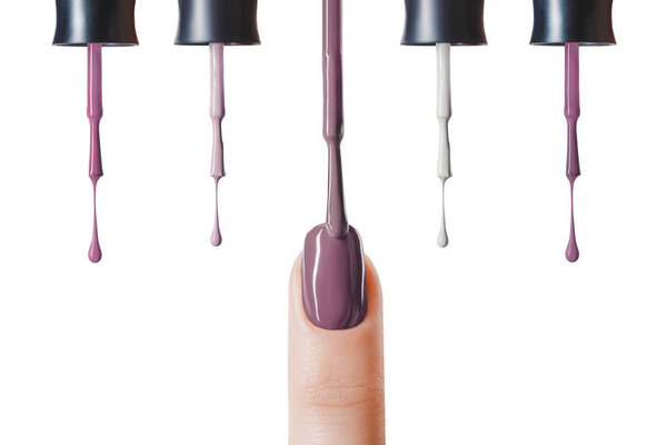 purple nail polish on fingernail with wet brush isolated on white 