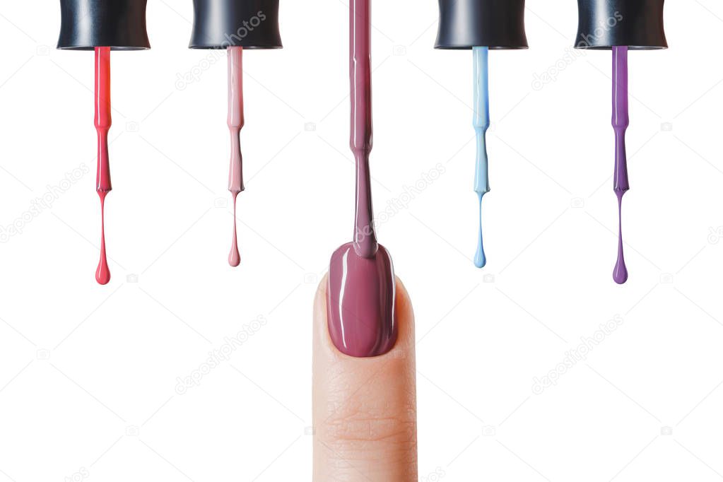 pastel nail polish on fingernail with wet brush isolated on white 